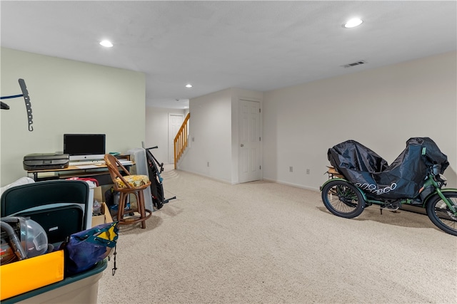 carpeted home office with recessed lighting