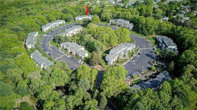 aerial overview of property's location featuring a forest