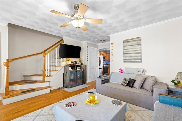 151 Bend St S Unit 2, Pawtucket, RI 02860 - living area featuring stairs, wood finished floors, crown molding, and ceiling fan