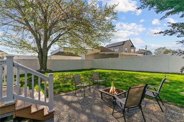 95 Vincent Ave, North Providence, RI 02904 - view of patio with a fire pit