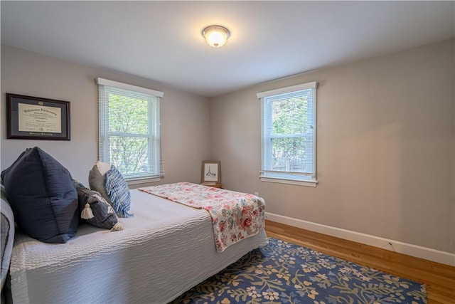 33 Perennial Dr, Cranston, RI 02920 - bedroom with baseboards and wood finished floors