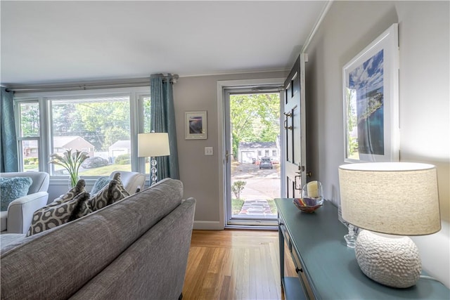 33 Perennial Dr, Cranston, RI 02920 - doorway featuring plenty of natural light, wood finished floors, crown molding, and baseboards