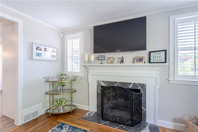 33 Perennial Dr, Cranston, RI 02920 - detailed view of a high end fireplace, wood finished floors, ornamental molding, and baseboards