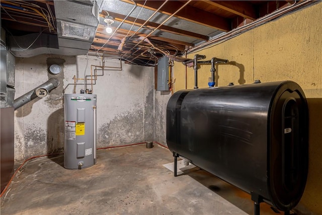 33 Perennial Dr, Cranston, RI 02920 - unfinished below grade area featuring water heater, oil tank, and electric panel