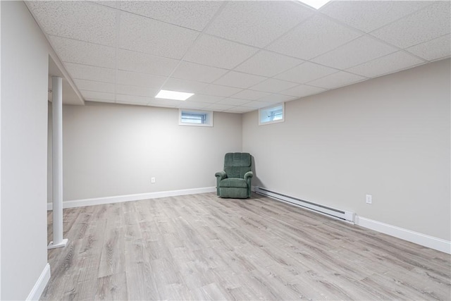 33 Perennial Dr, Cranston, RI 02920 - unfurnished room featuring a baseboard heating unit, wood finished floors, a drop ceiling, and baseboards