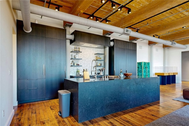 reception area with beamed ceiling and wooden ceiling