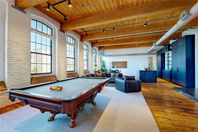 game room featuring track lighting, wooden ceiling, hardwood / wood-style flooring, pool table, and beamed ceiling