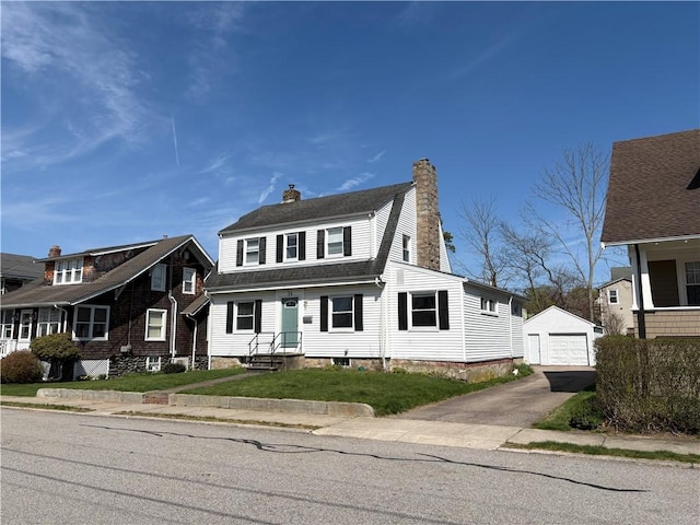 24 George St, Westerly, RI 02891 - colonial inspired home with an outdoor structure, a chimney, a detached garage, asphalt driveway, and roof with shingles