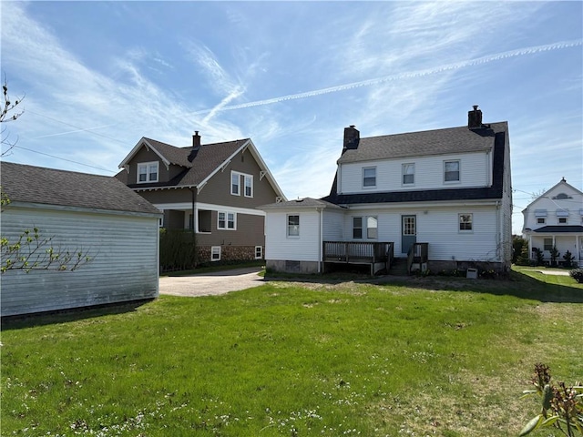 24 George St, Westerly, RI 02891 - back of house with a lawn, a wooden deck, and a chimney