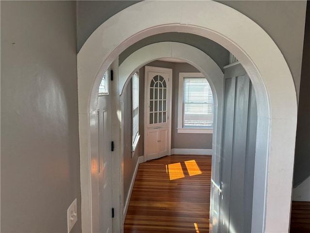 24 George St, Westerly, RI 02891 - entryway with wood finished floors, baseboards, and arched walkways