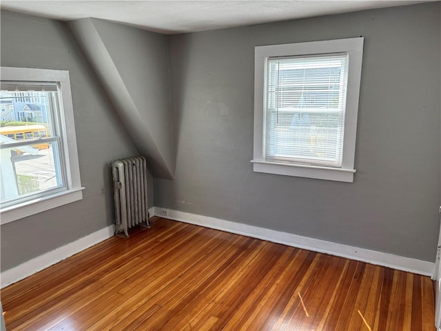24 George St, Westerly, RI 02891 - additional living space featuring radiator, baseboards, and wood finished floors