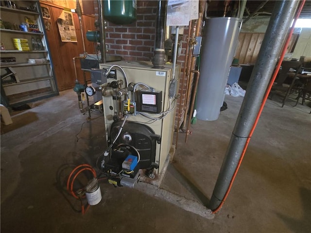 utility room featuring gas water heater and a heating unit
