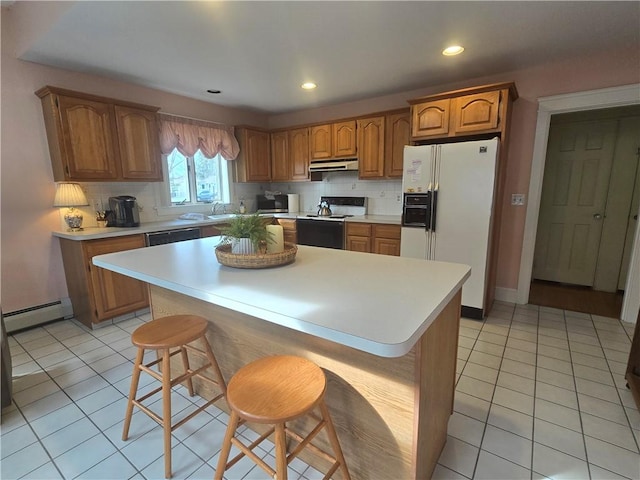 kitchen featuring white fridge with ice dispenser, electric range, baseboard heating, light countertops, and light tile patterned floors
