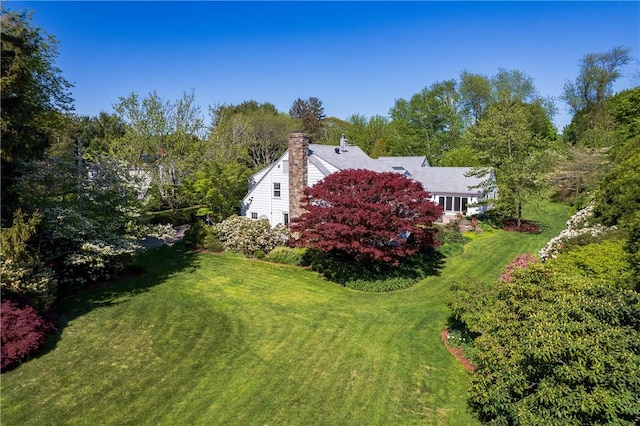 2 Cherry Ln, Bristol, RI 02809 - view of side of home featuring a lawn and a chimney