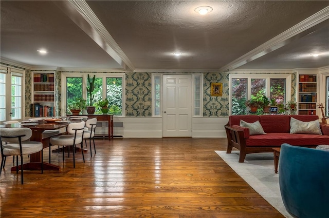 2 Cherry Ln, Bristol, RI 02809 - dining space with ornamental molding, hardwood / wood-style flooring, wainscoting, built in features, and wallpapered walls