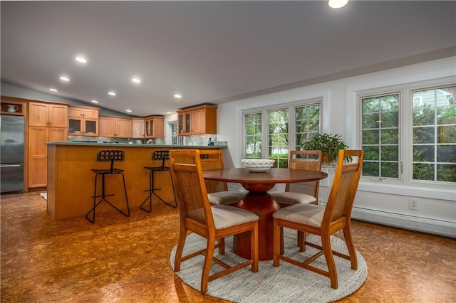 2 Cherry Ln, Bristol, RI 02809 - dining area with recessed lighting, vaulted ceiling, and a baseboard heating unit