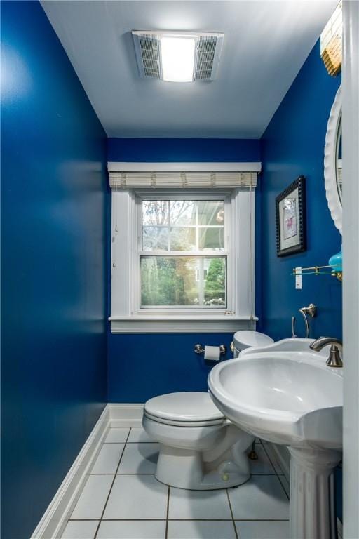 2 Cherry Ln, Bristol, RI 02809 - bathroom featuring tile patterned floors, toilet, and baseboards