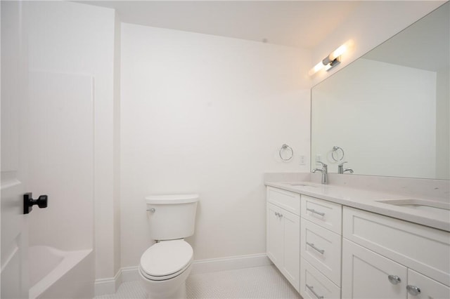 145 Wolf Rock Rd, Exeter, RI 02822 - bathroom featuring double vanity, toilet, tile patterned flooring, and baseboards
