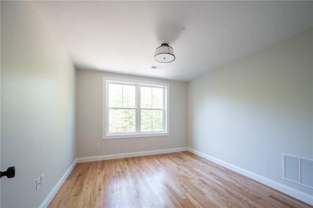 145 Wolf Rock Rd, Exeter, RI 02822 - empty room with light wood-style floors and baseboards