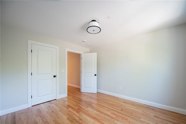 145 Wolf Rock Rd, Exeter, RI 02822 - unfurnished bedroom featuring light wood finished floors and baseboards