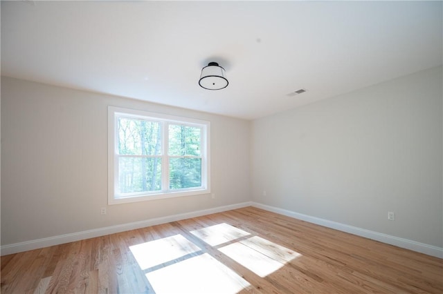 145 Wolf Rock Rd, Exeter, RI 02822 - empty room with light wood-type flooring and baseboards