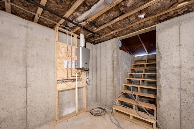 145 Wolf Rock Rd, Exeter, RI 02822 - unfinished below grade area featuring tankless water heater and stairway