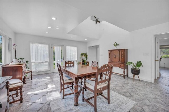 dining room featuring recessed lighting and baseboards