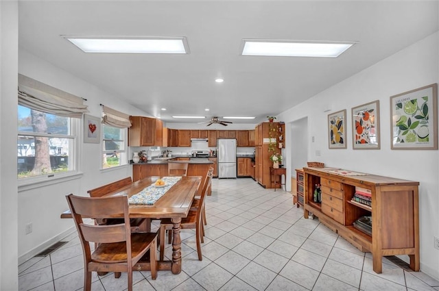 dining area featuring light tile patterned flooring, recessed lighting, and ceiling fan