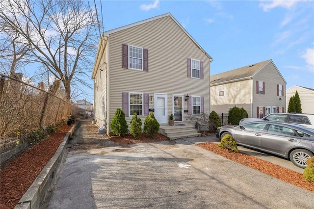 38 Brook St, Central Falls, RI 02863 - view of front of house with fence
