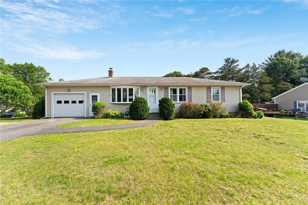 175 Gervais St, Coventry, RI 02816 - ranch-style home with driveway, an attached garage, a chimney, and a front yard