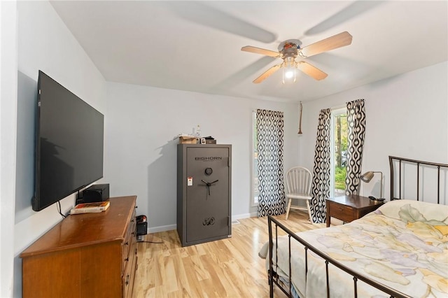 795 S Main St, Burrillville, RI 02859 - bedroom with light wood-type flooring, a desk, baseboards, and ceiling fan