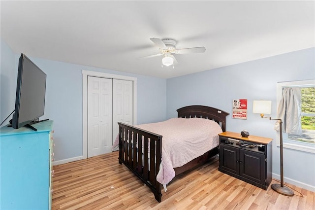 795 S Main St, Burrillville, RI 02859 - bedroom with light wood finished floors, baseboards, a closet, and a ceiling fan