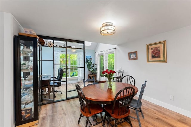 795 S Main St, Burrillville, RI 02859 - dining area with baseboards, light wood finished floors, and a desk