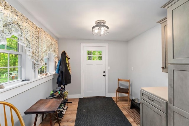 795 S Main St, Burrillville, RI 02859 - entryway featuring light wood finished floors and baseboards