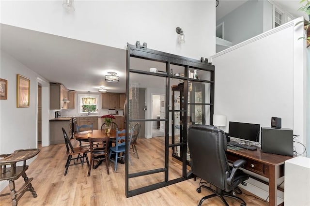 795 S Main St, Burrillville, RI 02859 - office space with light wood-style floors and a towering ceiling
