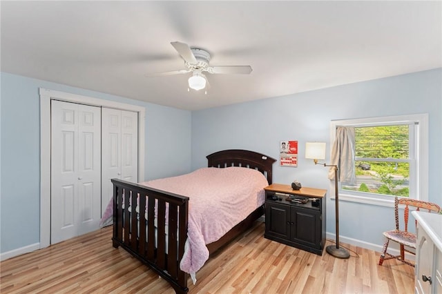 795 S Main St, Burrillville, RI 02859 - bedroom with light wood-style flooring, a closet, baseboards, and ceiling fan