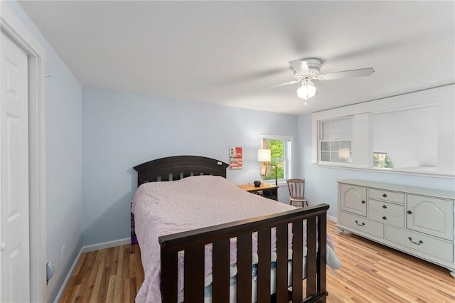 795 S Main St, Burrillville, RI 02859 - bedroom with light wood-type flooring, baseboards, and a ceiling fan