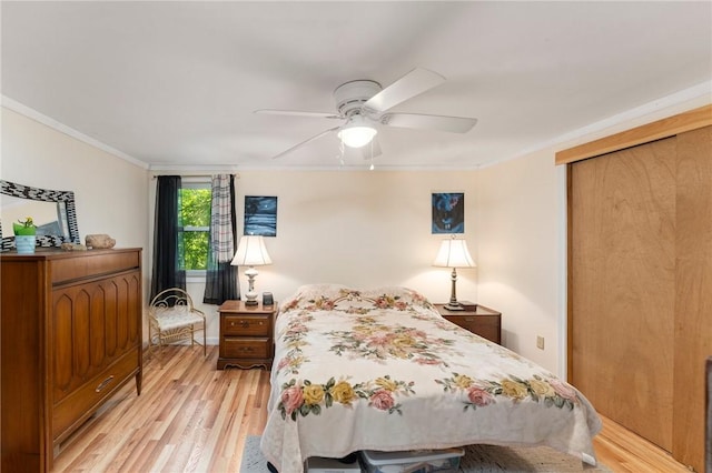 795 S Main St, Burrillville, RI 02859 - bedroom with light wood finished floors, crown molding, ceiling fan, and a closet