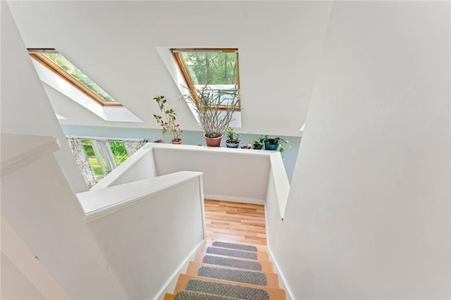 795 S Main St, Burrillville, RI 02859 - stairs with a skylight and wood finished floors