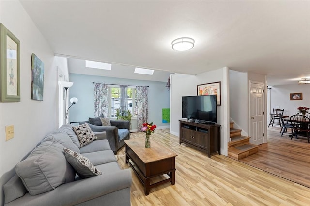 795 S Main St, Burrillville, RI 02859 - living area featuring light wood-style floors, stairs, and a skylight