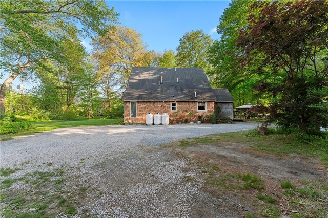 795 S Main St, Burrillville, RI 02859 - view of side of property with gravel driveway