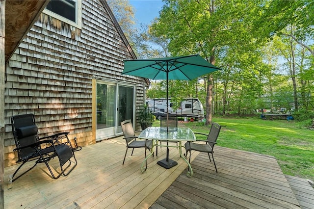 795 S Main St, Burrillville, RI 02859 - wooden deck featuring outdoor dining area and a lawn