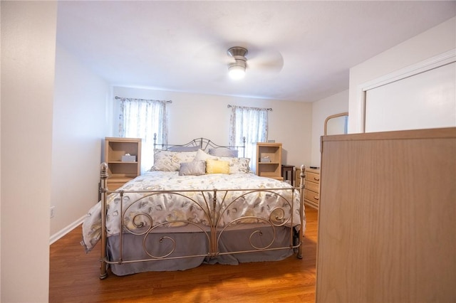 3399 Post Rd Unit 7, Warwick, RI 02886 - bedroom with wood finished floors, a ceiling fan, and baseboards