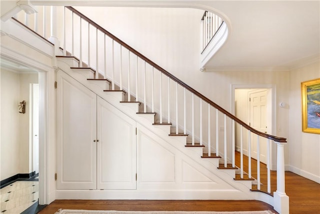 125 Grotto Ave, Providence, RI 02906 - staircase with wood finished floors and ornamental molding