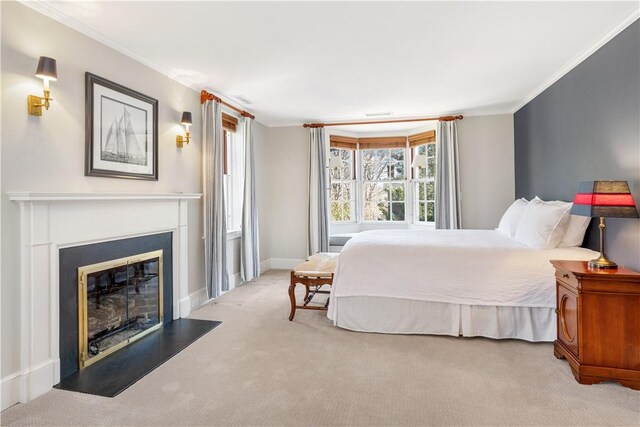125 Grotto Ave, Providence, RI 02906 - bedroom featuring carpet, a glass covered fireplace, crown molding, and baseboards