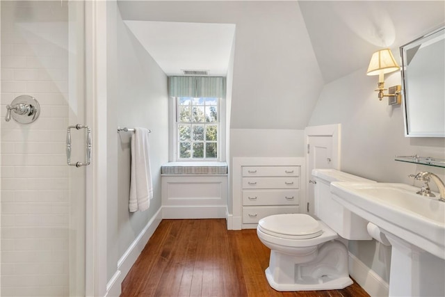 125 Grotto Ave, Providence, RI 02906 - full bath with hardwood / wood-style flooring, toilet, a sink, a shower, and baseboards