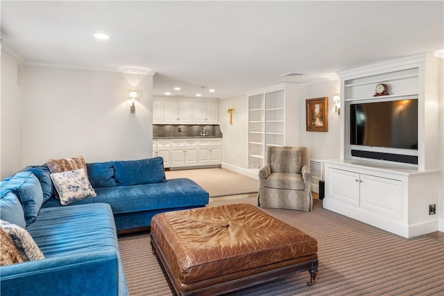 125 Grotto Ave, Providence, RI 02906 - living area featuring light colored carpet, recessed lighting, crown molding, and baseboards