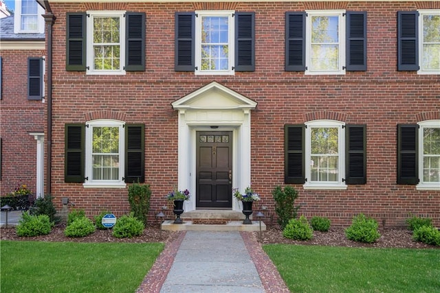 125 Grotto Ave, Providence, RI 02906 - view of front of property featuring brick siding