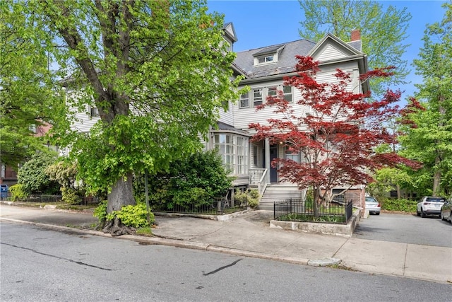 view of front of home with a chimney