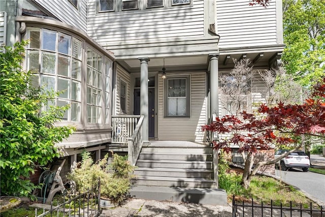 doorway to property with a porch